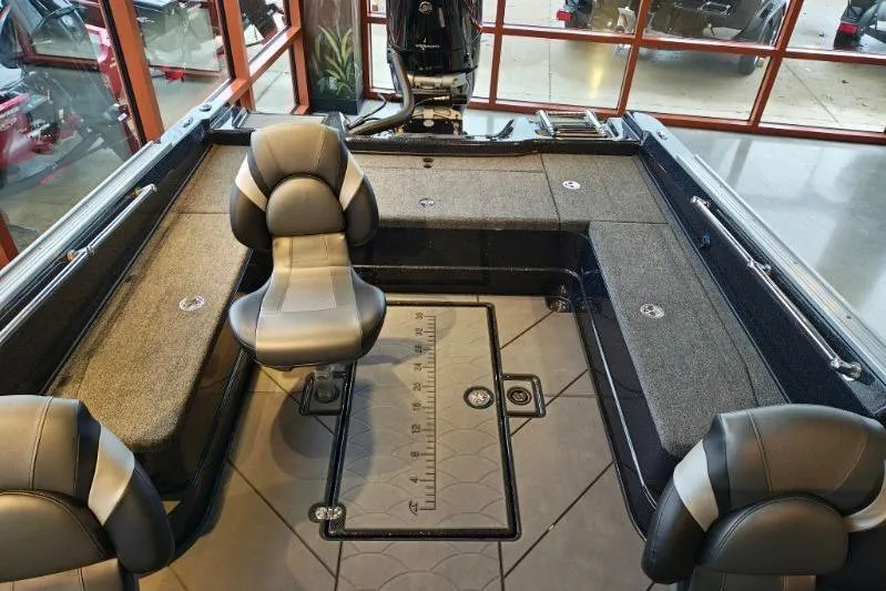 Slide: The Image of 2026 Nitro ZV21 boat interior with seating and storage compartments, showcasing modern design and functionality. - 16