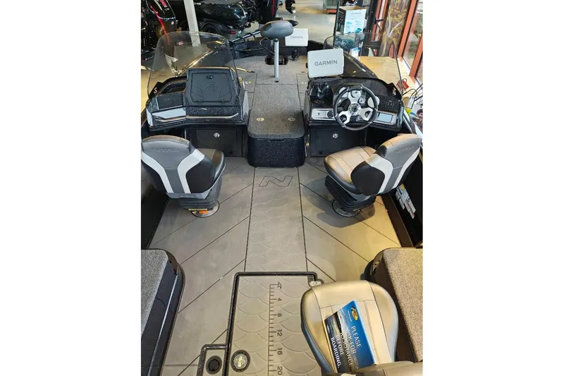 Slide: The Image of Interior view of 2026 Nitro ZV21 boat with Garmin navigation system and seating. - 20