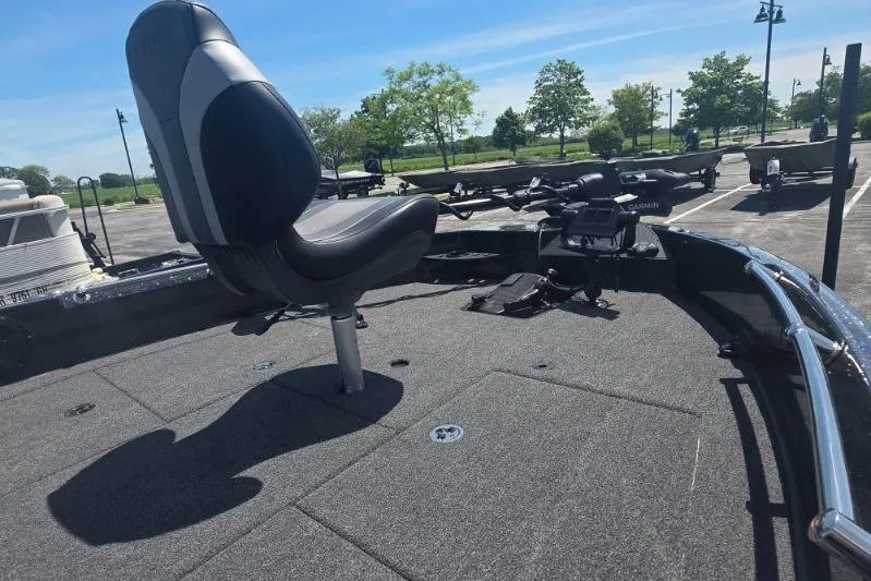Slide: The Image of Fishing boat deck with seat, Nitro ZV21 model, 2026, parked outdoors under clear sky. - 24