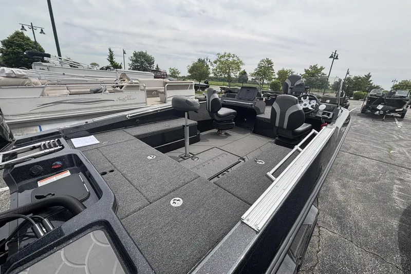 Slide: The Image of 2026 Nitro ZV21 fishing boat with spacious deck and modern seating. - 27