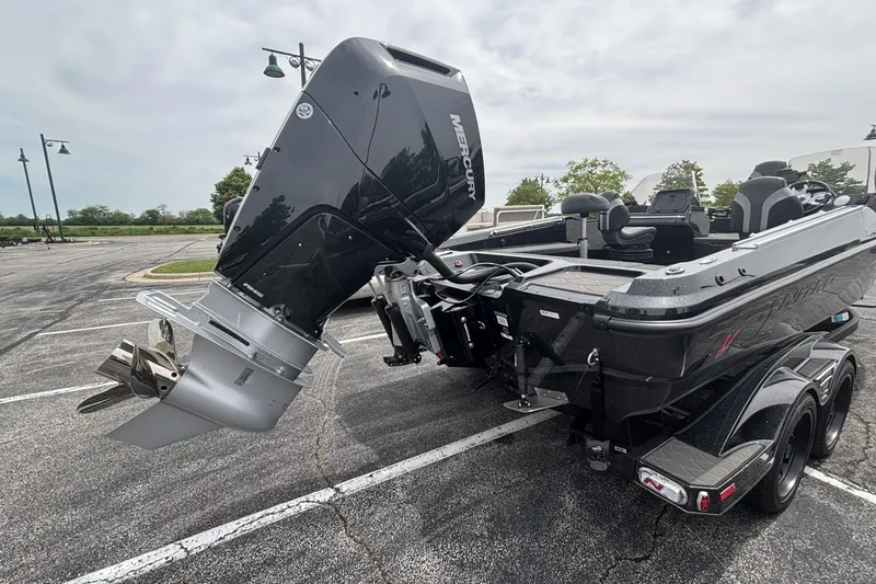 Slide: The Image of 2026 Nitro ZV21 boat with Mercury outboard engine in parking lot. - 28