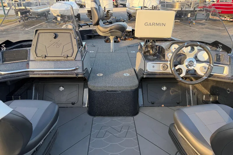 Slide: The Image of 2026 Nitro ZV21 boat interior with Garmin navigation system and sleek seating. - 6