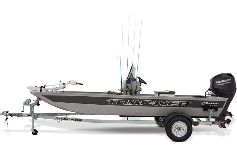 Slide: The Image of 2026 Tracker Bass Tracker Classic CC boat interior with steering console and trolling motor. - 4