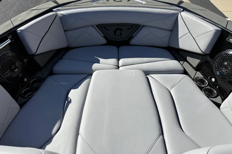 Slide: The Image of Luxurious interior of 2026 Centurion Nv243 boat with sleek gray seating and cup holders. - 7