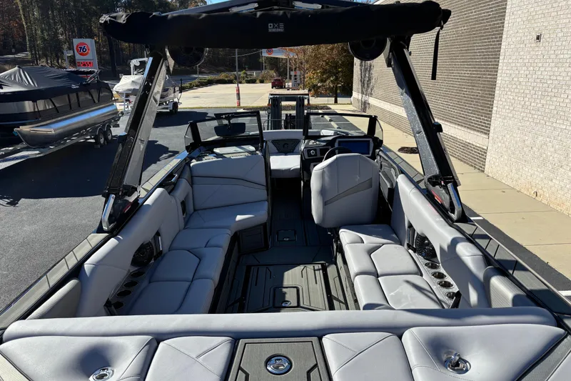 Slide: The Image of Interior view of 2026 Centurion Nv243 boat with luxurious seating and modern design. - 9