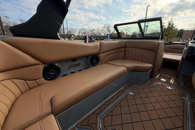 Slide: The Image of Luxurious interior of 2026 MB B52 21 Alpha boat with tan leather seating. - 28