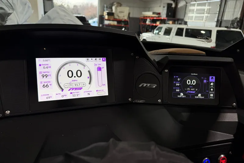 Slide: The Image of Dashboard of 2026 MB B52 21 Alpha boat with digital displays and controls. - 35
