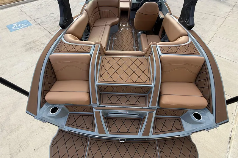 Slide: The Image of Wet Sounds speakers on MB B52 21 Alpha, 2026 model, in a sleek black finish. - 9