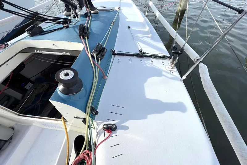 Slide: The Image of 2015 Wraceboats GP26 sailboat deck with winch and rigging details. - 14