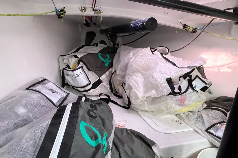 Slide: The Image of Interior of a 2015 Wraceboats GP26 sailboat with neatly stored sails and equipment. - 20