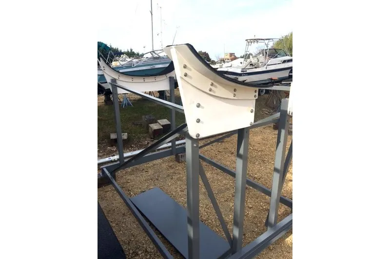 Slide: The Image of Boat cradle for Wraceboats GP26, 2015 model, on a gravel surface. - 23