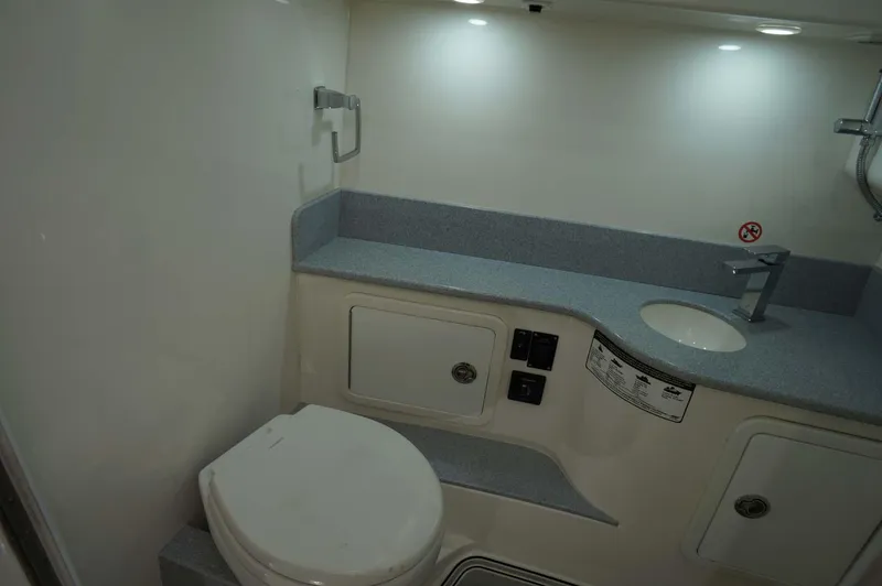 Slide: The Image of Modern bathroom in 2020 Concept 44' Cuddy Cabin boat, featuring toilet and sink. - 11