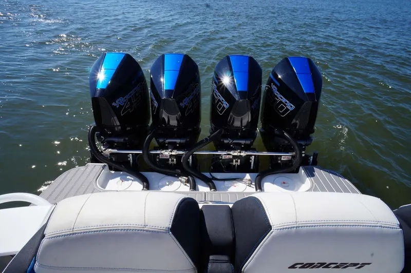 Slide: The Image of Four powerful outboard motors on a 2020 Concept 44' Cuddy Cabin boat. - 26