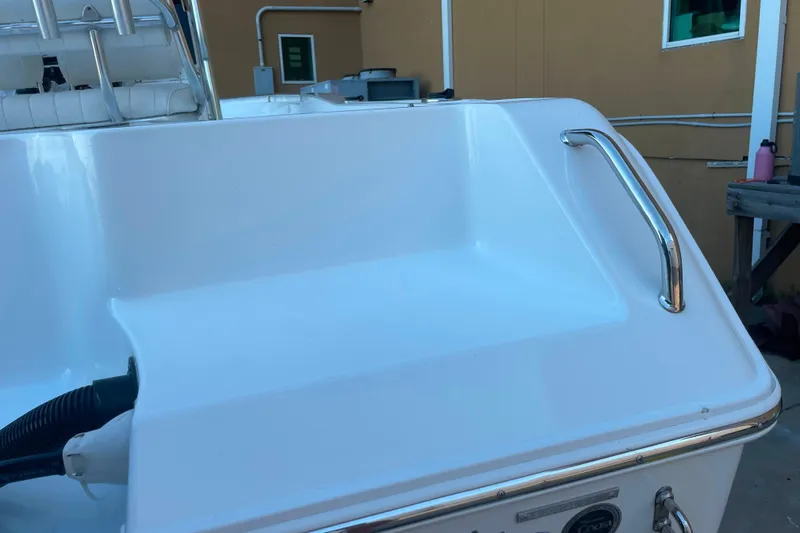 Slide: The Image of 2017 Sea Hunt Triton 210 boat deck with stainless steel railing. - 19