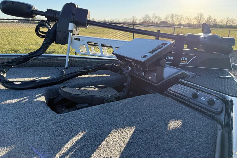 Slide: The Image of 2026 Phoenix 819 ZXL boat with advanced trolling motor and control panel. - 16