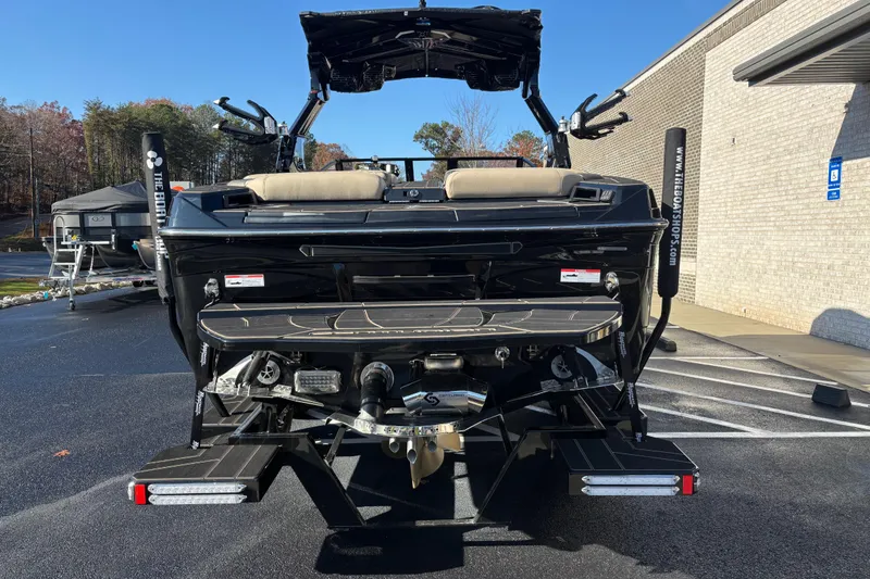 Slide: The Image of 2026 Centurion Ri245 boat rear view, showcasing sleek design and advanced features. - 4