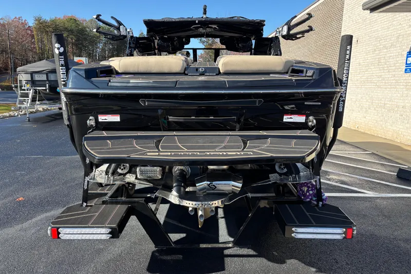 Slide: The Image of 2026 Centurion Ri245 boat rear view, showcasing sleek design and advanced features. - 5