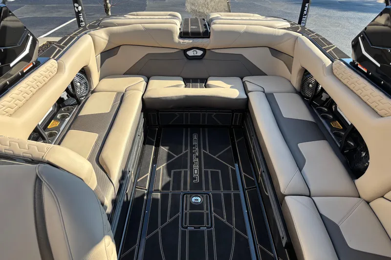 Slide: The Image of Luxurious interior of 2026 Centurion Ri245 boat with beige seating and modern design. - 9