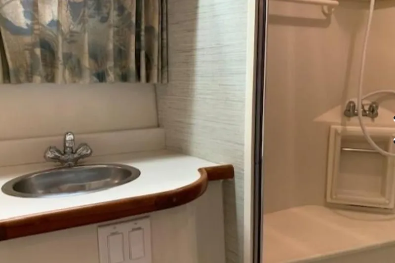 Slide: The Image of Bathroom interior of 1994 Carver 440 Aft Cabin Motor Yacht with sink and shower. - 7