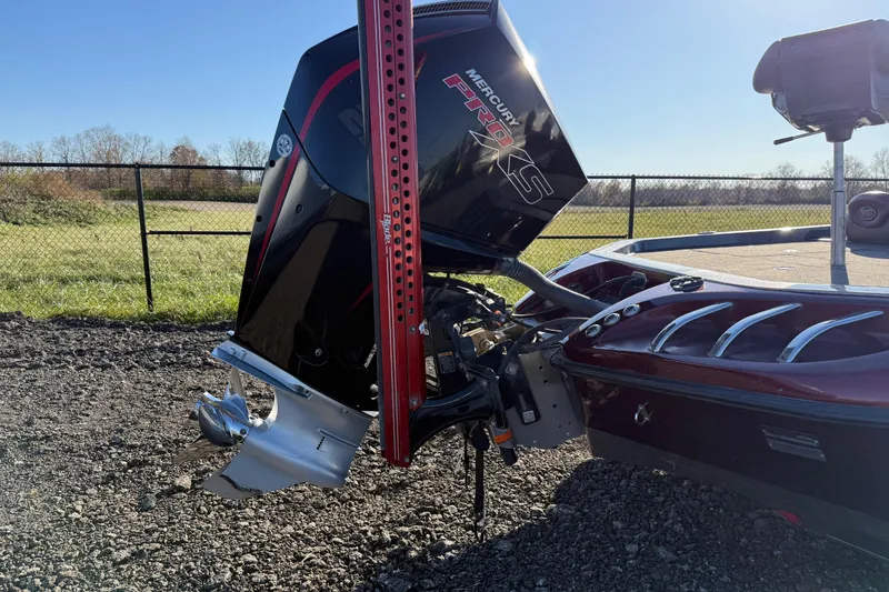 Slide: The Image of 2015 Ranger Z521C boat with Mercury Pro XS engine, parked on gravel. - 10