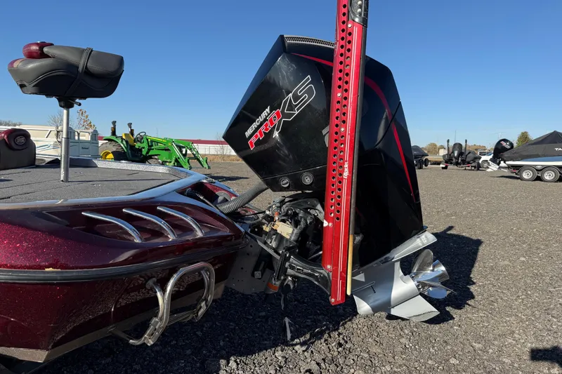 Slide: The Image of 2015 Ranger Z521C boat with Mercury Pro XS engine, parked outdoors. - 13