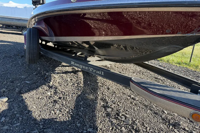 Slide: The Image of 2015 Ranger Z521C Ranger Cup boat on trailer, parked on gravel. - 15