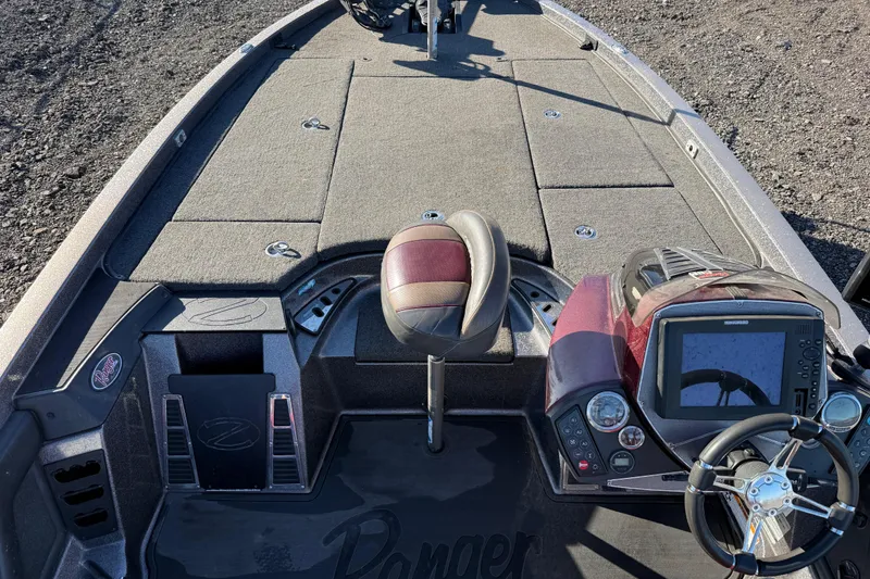 Slide: The Image of 2015 Ranger Z521C Ranger Cup Equipped boat interior with steering wheel and control panel. - 3