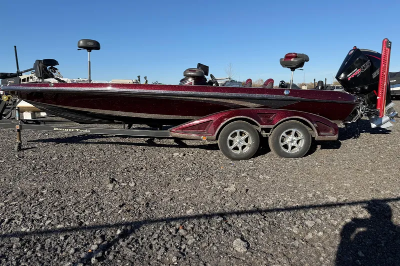 Slide: The Image of 2015 Ranger Z521C Ranger Cup Equipped boat on trailer, parked on gravel. - 5