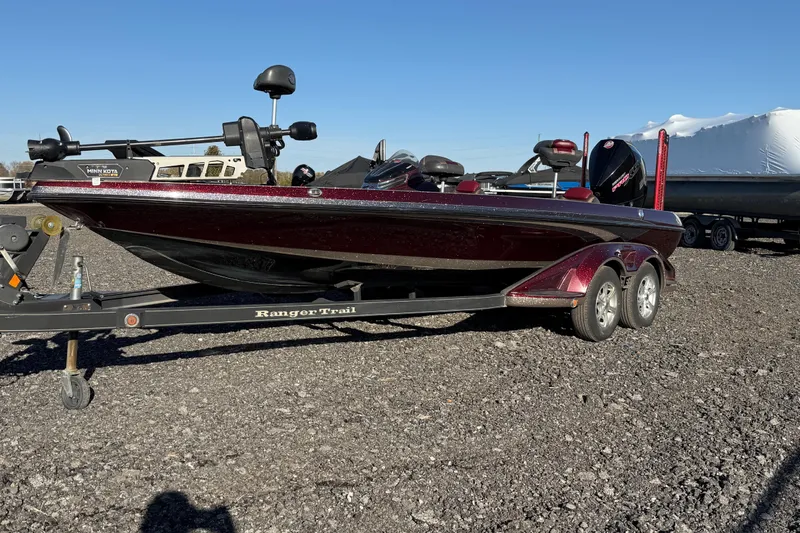 Slide: The Image of 2015 Ranger Z521C Ranger Cup Equipped boat on trailer, parked on gravel. - 6