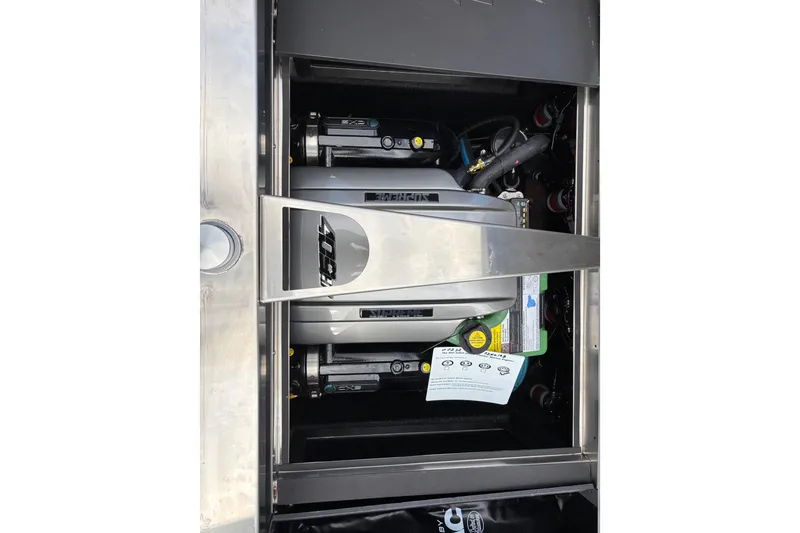 Slide: The Image of Engine compartment of 2026 Supreme S220 boat, showcasing powerful machinery and components. - 12