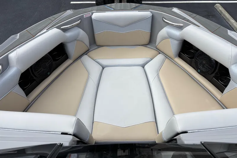 Slide: The Image of Luxurious seating area of 2026 Supreme S220 boat with beige and gray upholstery. - 6