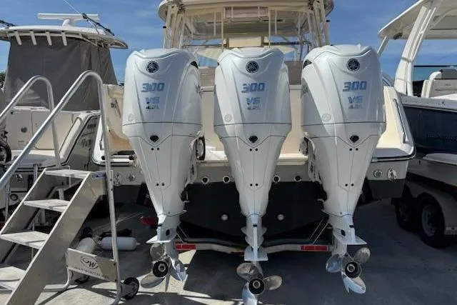 Slide: The Image of 2023 Grady-White Freedom 335 boat with triple Yamaha 300 V6 outboard engines. - 9