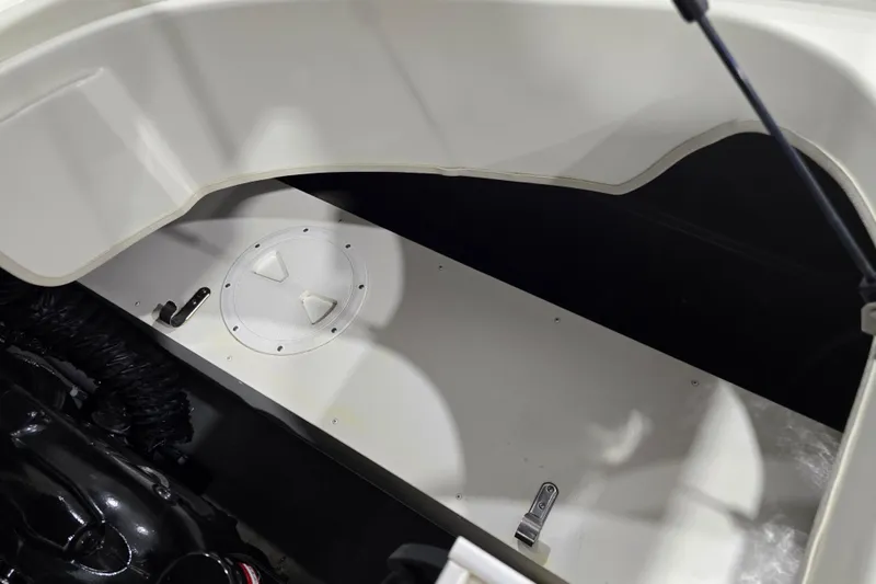 Slide: The Image of 2014 Larson All American 23 boat interior storage compartment detail. - 35