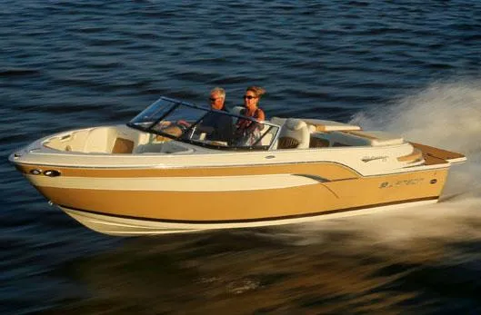 Slide: The Image of Close-up of 2014 Larson All American 23 boat hull on trailer in garage. - 5