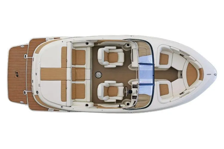 Slide: The Image of 2014 Larson All American 23 boat in a garage, blue and white exterior. - 7