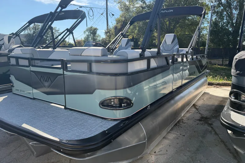 The Image of 2026 Avalon Venture pontoon boat with sleek design and modern seating. - 1