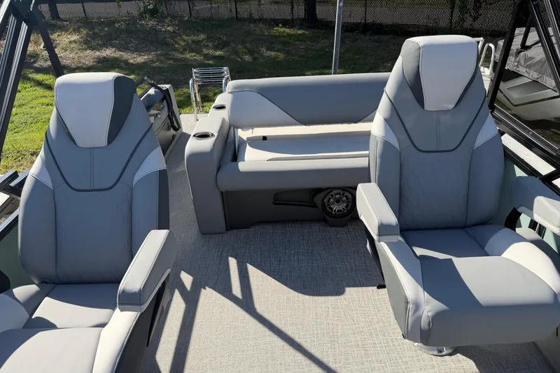 Slide: The Image of 2026 Avalon Venture boat interior with modern gray seating and sleek design. - 4