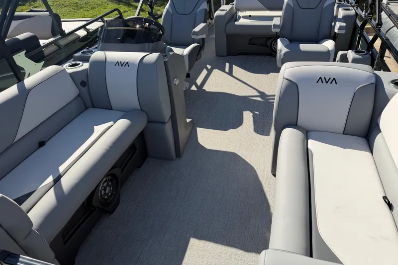 Slide: The Image of 2026 Avalon Venture boat interior with gray seating and modern design. - 6