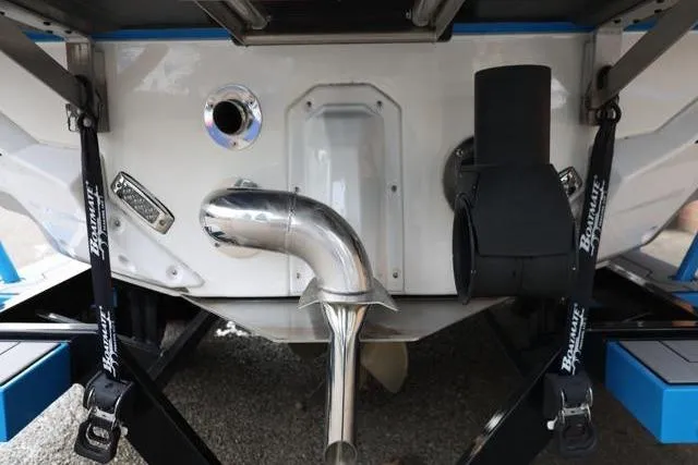 Slide: The Image of 2022 Nautique Super Air Nautique S23 boat stern with exhaust and hardware. - 10