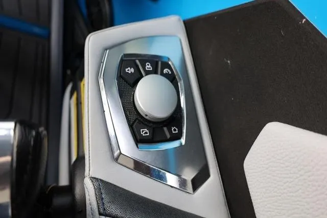 Slide: The Image of Control panel of 2022 Nautique Super Air Nautique S23 boat, featuring a sleek design. - 16