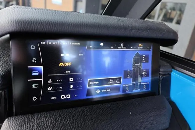 Slide: The Image of Touchscreen display of 2022 Nautique Super Air Nautique S23 boat dashboard. - 17