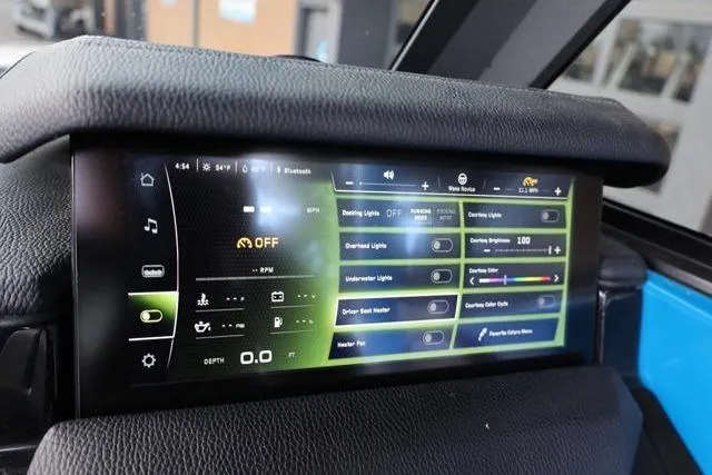 Slide: The Image of Touchscreen control panel in 2022 Nautique Super Air Nautique S23 boat, displaying various settings. - 18