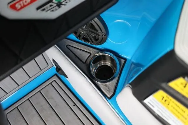 Slide: The Image of Cup holder and speaker detail on 2022 Nautique Super Air Nautique S23 boat. - 30