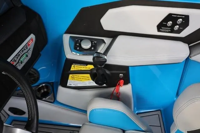 Slide: The Image of Interior controls of 2022 Nautique Super Air Nautique S23 boat, featuring sleek design and modern technology. - 31