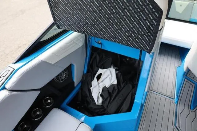 Slide: The Image of Interior storage compartment of 2022 Nautique Super Air Nautique S23 boat. - 41