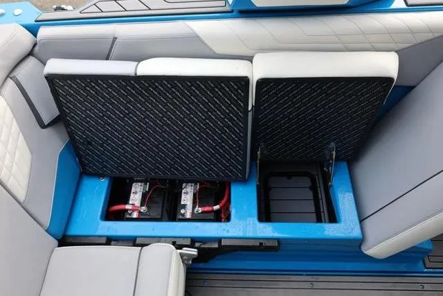 Slide: The Image of 2022 Nautique Super Air Nautique S23 interior with open battery compartment. - 43