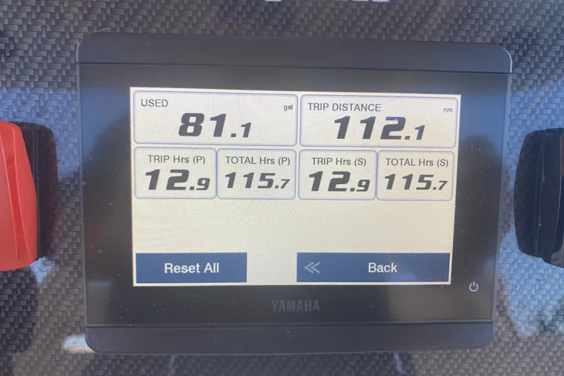 Slide: The Image of Helm of 2025 Grady-White Canyon 306 with advanced navigation displays and controls. - 8