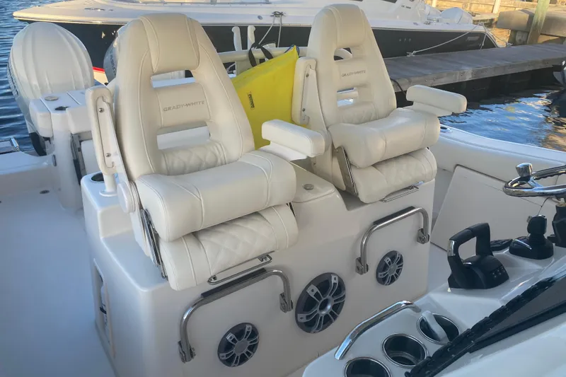 Slide: The Image of Yamaha display showing fuel usage and trip data on 2025 Grady-White Canyon 306 boat. - 9