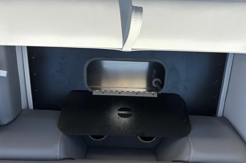 Slide: The Image of Interior of 2026 Veranda 22 FRC Plus 2 boat with seating and storage. - 7