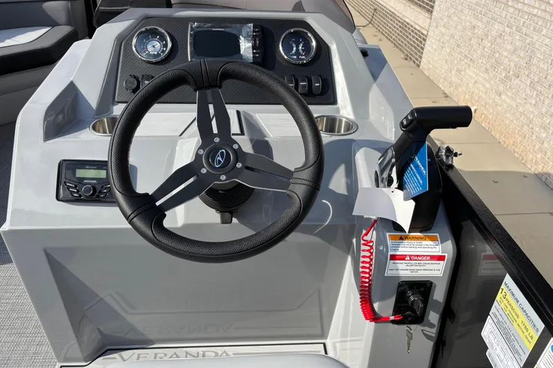 Slide: The Image of Steering console of 2026 Veranda 22 FRC Plus 2 boat with gauges and controls. - 9